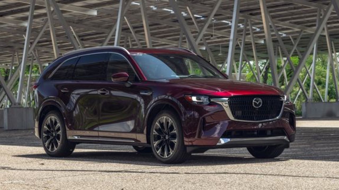 2024 Mazda CX-90 in red and black color on road