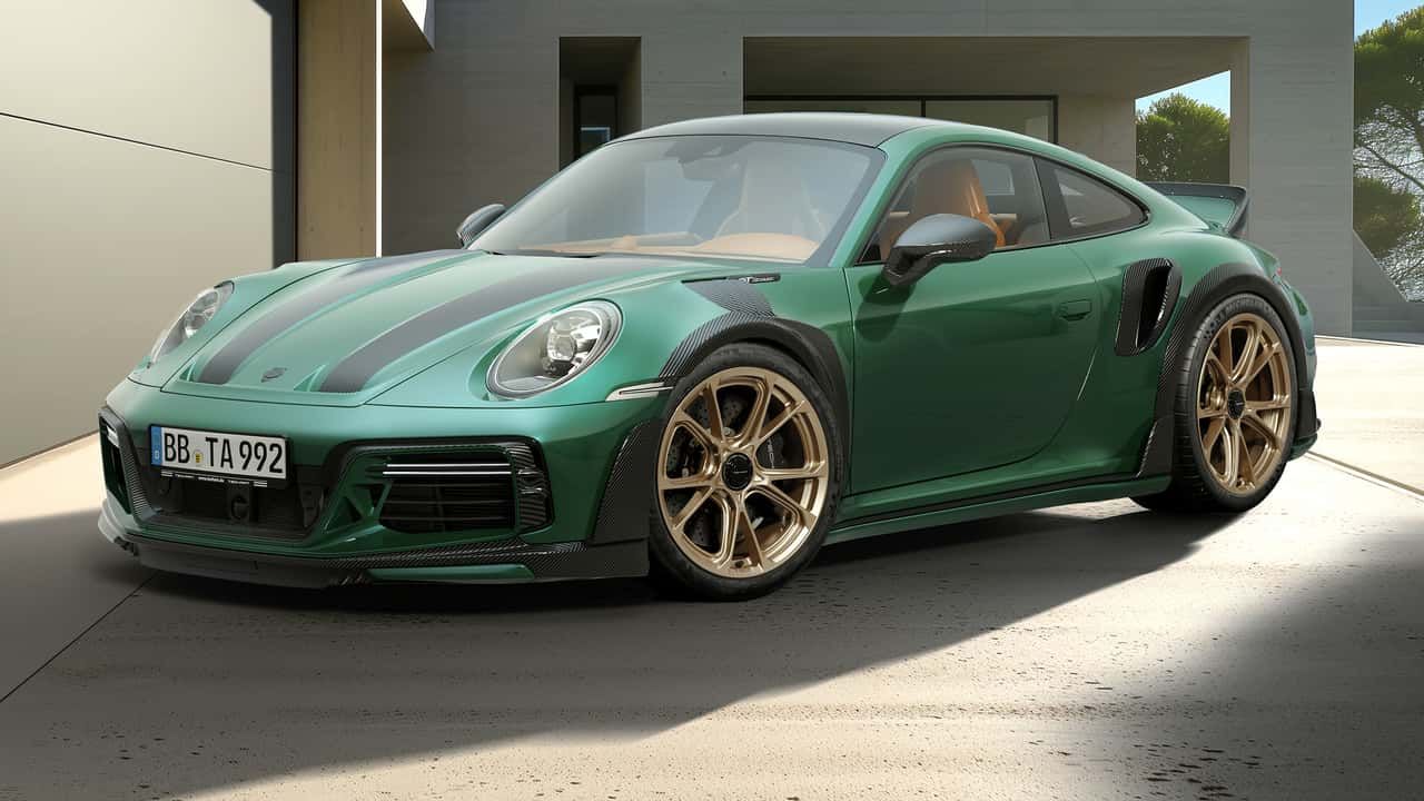 A image of Porsche 911 Turbo S With Black accent and Large Wheels is parked on a paved road