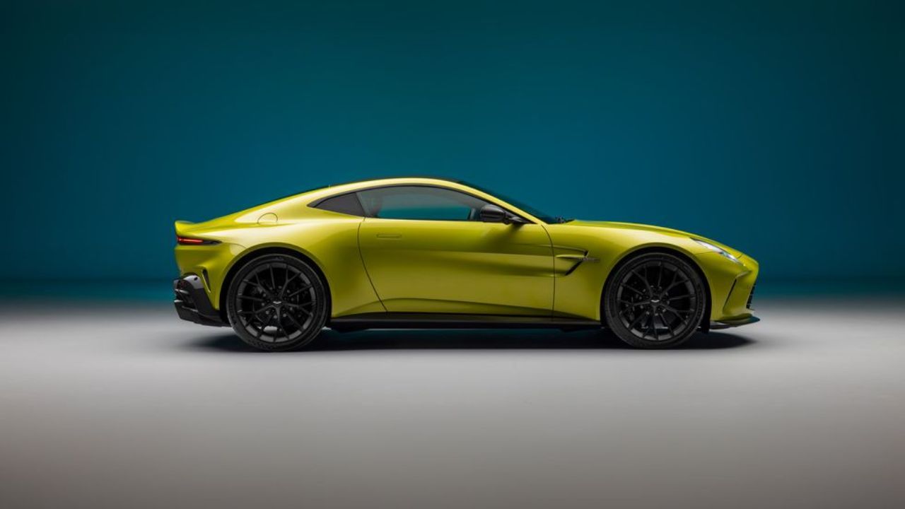 Aston Martin Vantage in yellow color in blue background