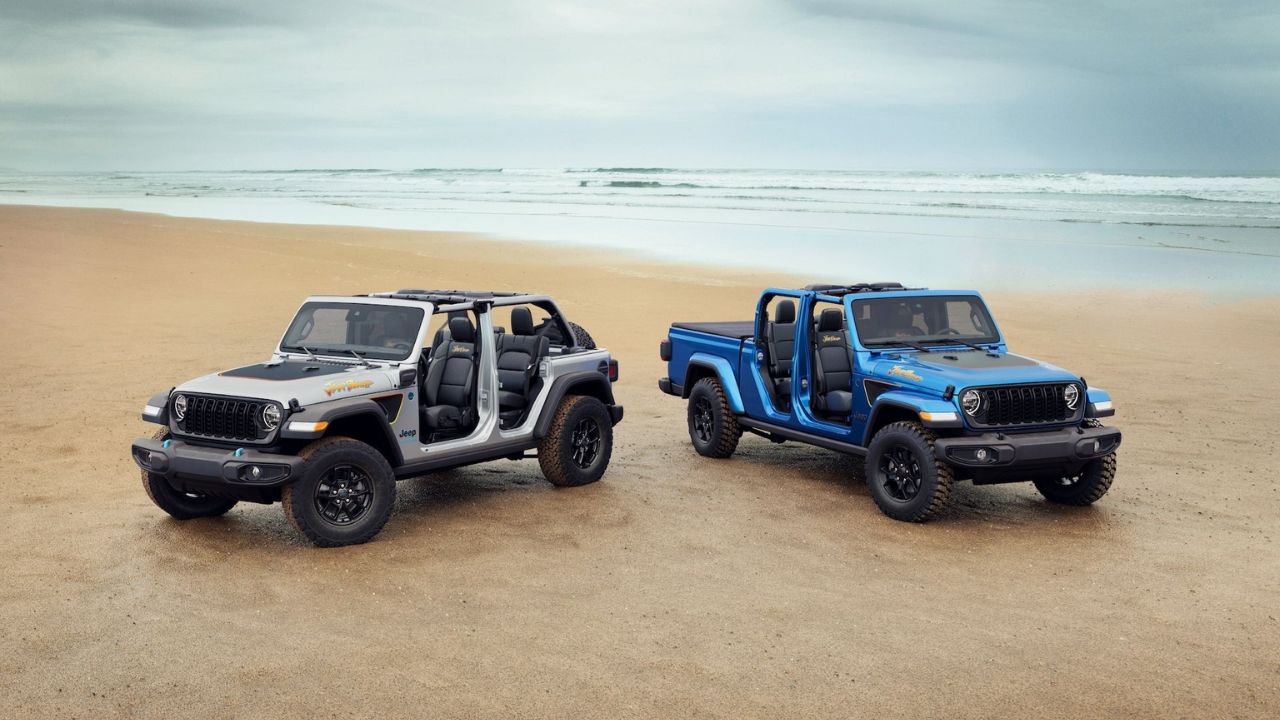 jeep wrangler in blue and silver color near beach