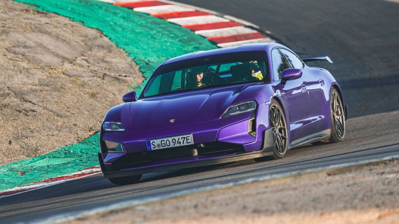 Porsche Taycan Turbo GT in purple color on road